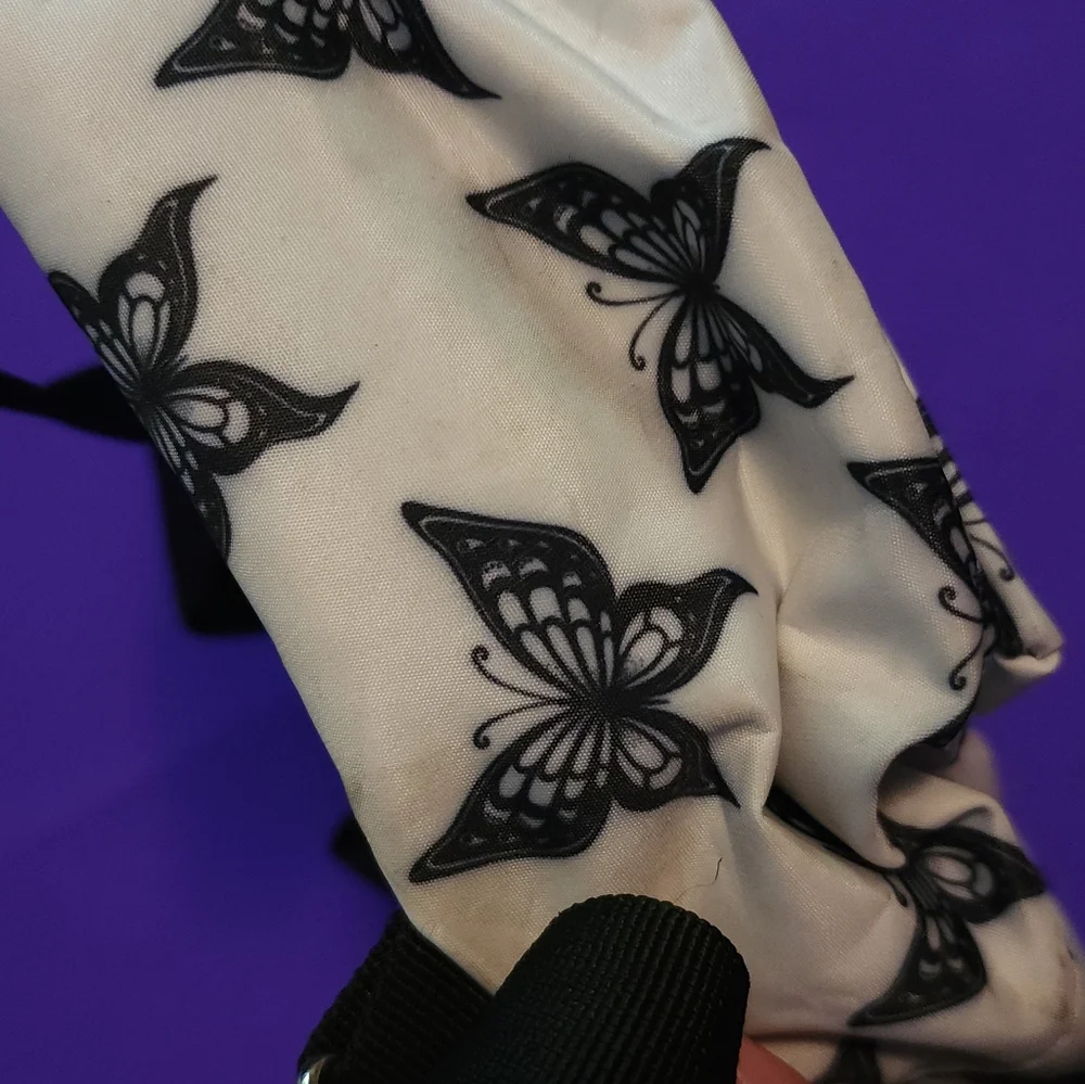 Black and white butterfly backpack